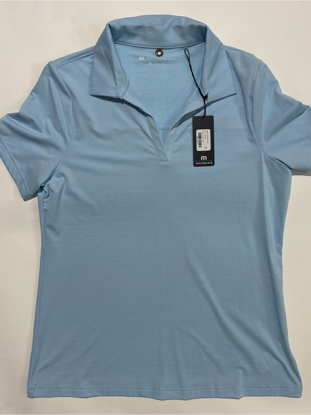 NWT Travis Mathew Women's Sky Blue Short Sleeve Golf Onward Polo TMA46416